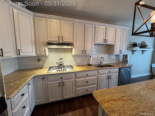 7348 William Dr, Shelby Twp, MI 48316 - kitchen featuring a sink, stainless steel appliances, under cabinet range hood, dark wood-style floors, and white cabinetry