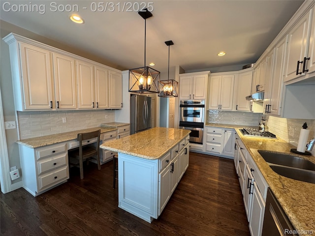 7348 William Dr, Shelby Twp, MI 48316 - kitchen with appliances with stainless steel finishes, a sink, white cabinets, backsplash, and recessed lighting