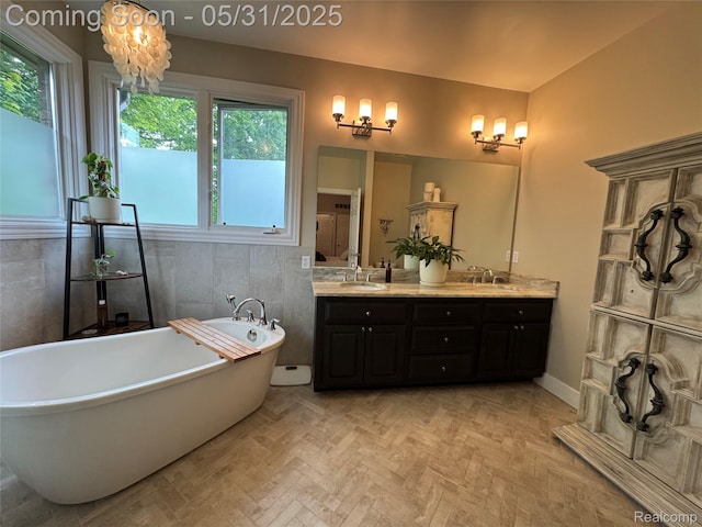 7348 William Dr, Shelby Twp, MI 48316 - full bathroom featuring double vanity and a freestanding tub
