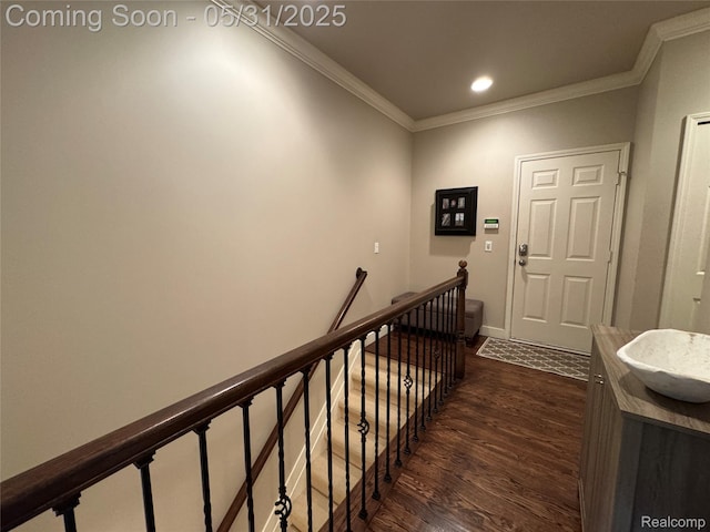 7348 William Dr, Shelby Twp, MI 48316 - hall with an upstairs landing, dark wood-style flooring, ornamental molding, baseboards, and recessed lighting