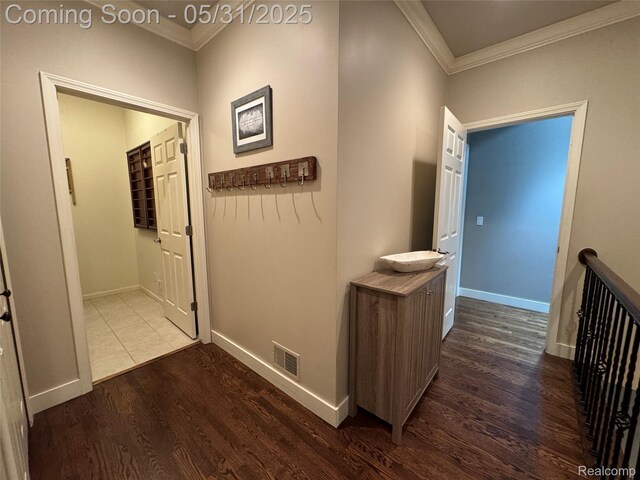 7348 William Dr, Shelby Twp, MI 48316 - corridor with crown molding, wood finished floors, and baseboards