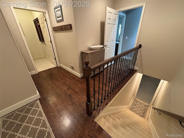 7348 William Dr, Shelby Twp, MI 48316 - stairway featuring wood finished floors and baseboards