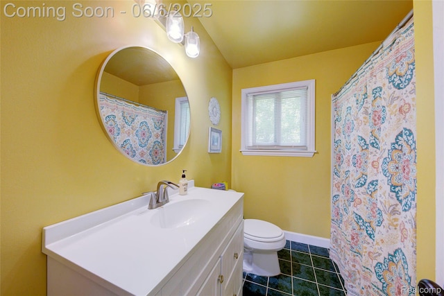 2470 E Highland Rd, Howell, MI 48843 - bathroom featuring vanity, toilet, tile patterned floors, and baseboards