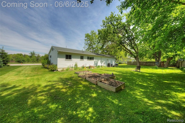 2470 E Highland Rd, Howell, MI 48843 - view of yard featuring a garden