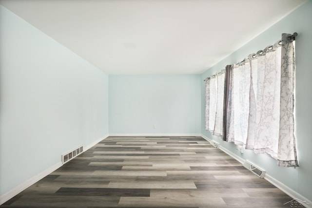3637 Cora St, Saginaw, MI 48601 - unfurnished room featuring wood finished floors and baseboards