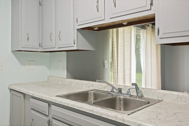 3637 Cora St, Saginaw, MI 48601 - kitchen featuring a sink and light countertops