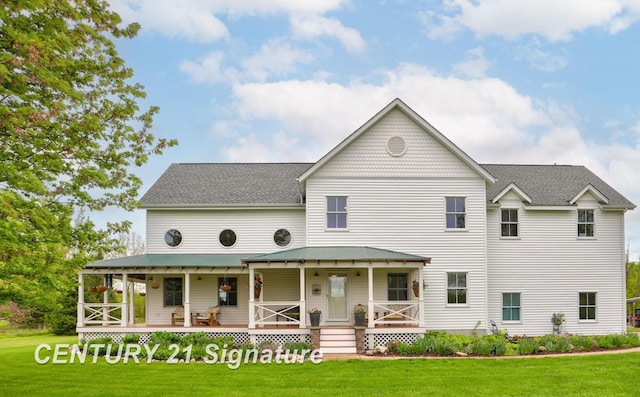 12751 Wilkinson Rd, Freeland, MI 48623 - victorian home with covered porch and a front yard