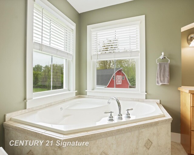 12751 Wilkinson Rd, Freeland, MI 48623 - full bath featuring healthy amount of natural light, a garden tub, and vanity