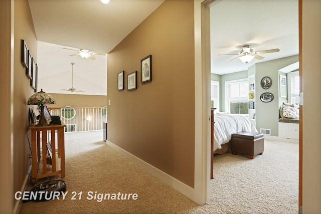 12751 Wilkinson Rd, Freeland, MI 48623 - hallway with carpet flooring, baseboards, and lofted ceiling