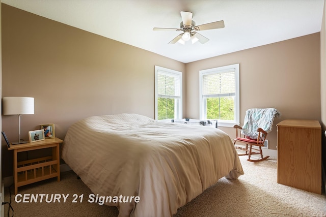 12751 Wilkinson Rd, Freeland, MI 48623 - carpeted bedroom featuring ceiling fan and baseboards