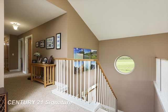 12751 Wilkinson Rd, Freeland, MI 48623 - hall featuring an upstairs landing, carpet floors, baseboards, and a high ceiling