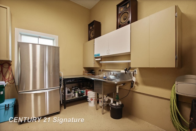 12751 Wilkinson Rd, Freeland, MI 48623 - kitchen featuring freestanding refrigerator and white cabinets