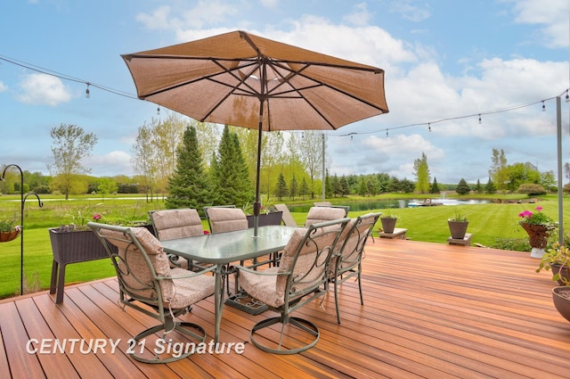 12751 Wilkinson Rd, Freeland, MI 48623 - wooden deck featuring outdoor dining area, a water view, and a yard