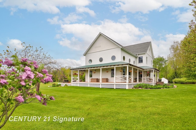 12751 Wilkinson Rd, Freeland, MI 48623 - back of property with a lawn, a porch, and a shingled roof