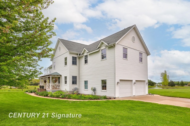 12751 Wilkinson Rd, Freeland, MI 48623 - view of side of home with a yard, an attached garage, and driveway
