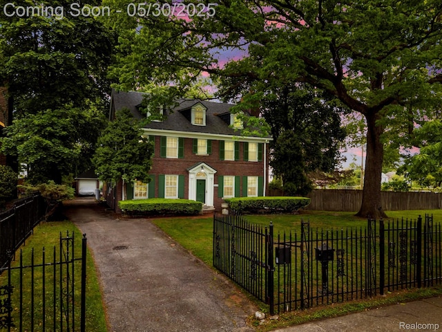 2918 Burns St, Detroit, MI 48214 - colonial inspired home with brick siding and asphalt driveway