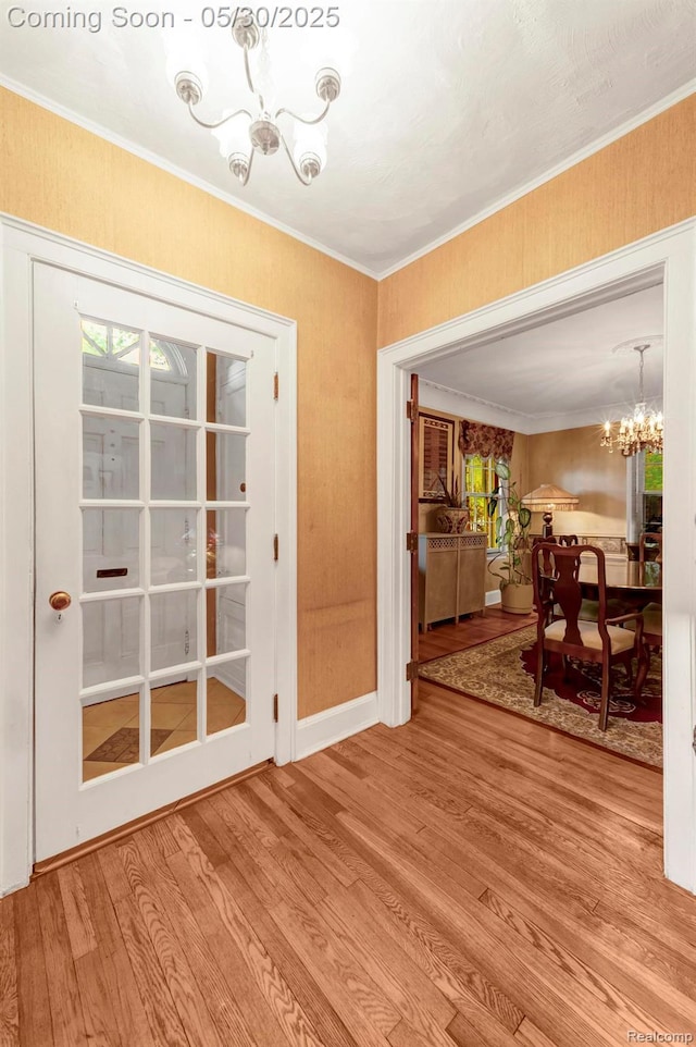 2918 Burns St, Detroit, MI 48214 - dining area featuring a chandelier, wood finished floors, and crown molding