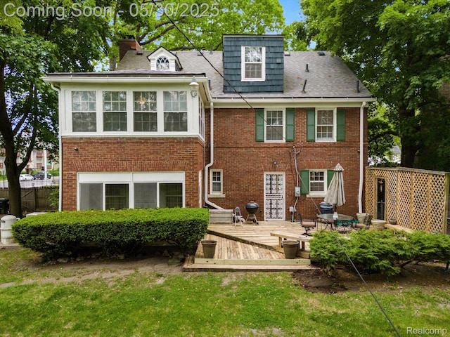 2918 Burns St, Detroit, MI 48214 - rear view of property with a wooden deck, a chimney, and brick siding