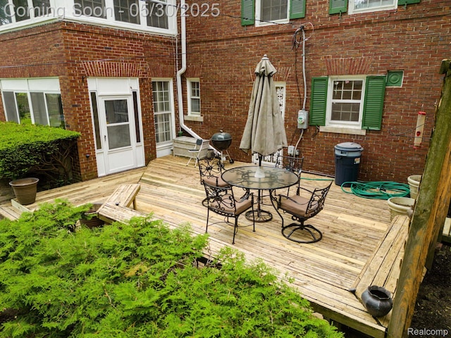 2918 Burns St, Detroit, MI 48214 - wooden terrace featuring outdoor dining area
