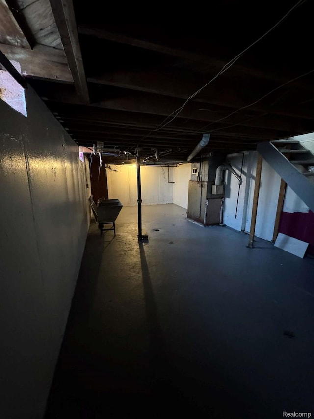 19961 Greenfield Rd, Detroit, MI 48235 - unfinished basement featuring heating unit
