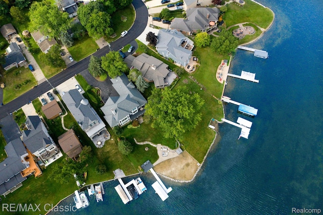 826 Wolverine Dr, Wolverine Lake, MI 48390 - aerial view of property and surrounding area featuring nearby suburban area and a large body of water