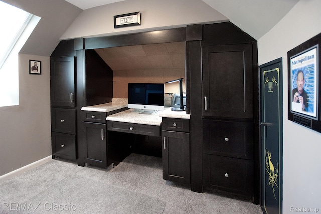826 Wolverine Dr, Wolverine Lake, MI 48390 - bathroom featuring lofted ceiling and baseboards