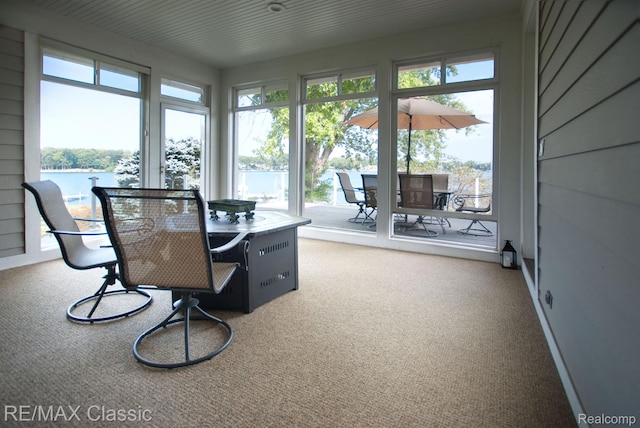 826 Wolverine Dr, Wolverine Lake, MI 48390 - carpeted office space with healthy amount of natural light and a water view