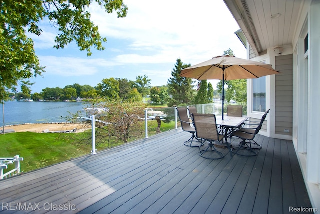 826 Wolverine Dr, Wolverine Lake, MI 48390 - wooden deck featuring a water view and outdoor dining area