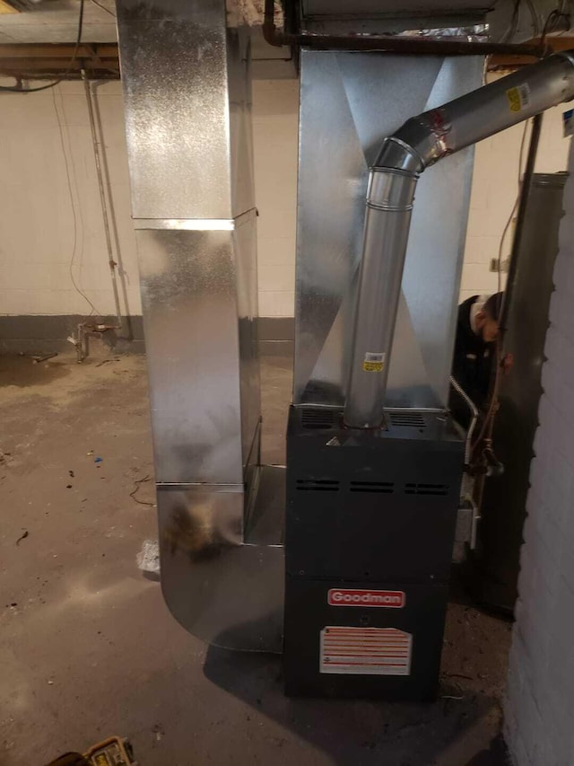7269 Minock St, Detroit, MI 48228 - utility room featuring heating unit