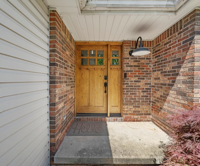 826 Jennie Pl, Monroe, MI 48161 - view of exterior entry with brick siding