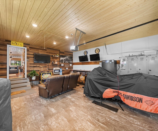 826 Jennie Pl, Monroe, MI 48161 - living room with wood walls, wood ceiling, and recessed lighting