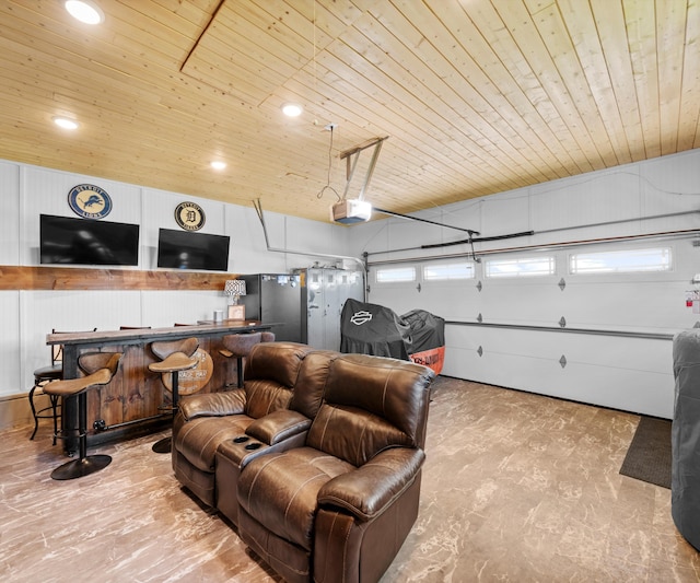 826 Jennie Pl, Monroe, MI 48161 - garage featuring wood ceiling, a garage door opener, freestanding refrigerator, and recessed lighting