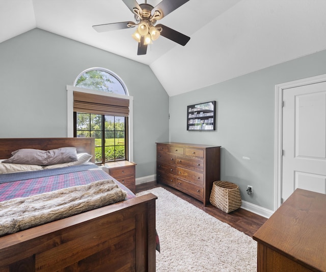 826 Jennie Pl, Monroe, MI 48161 - bedroom featuring lofted ceiling, baseboards, dark wood-style floors, and a ceiling fan