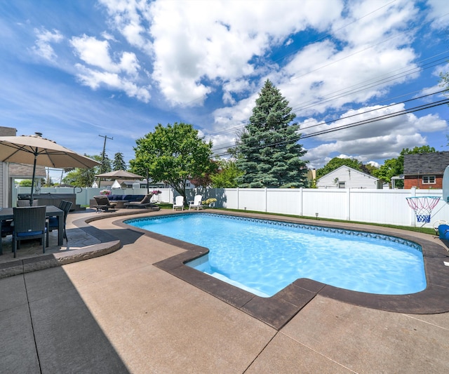 826 Jennie Pl, Monroe, MI 48161 - view of swimming pool featuring a patio area, a fenced backyard, and outdoor dining space