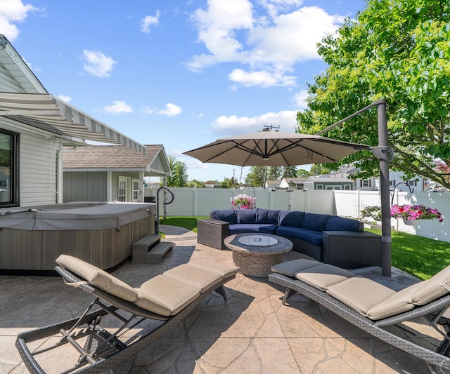 826 Jennie Pl, Monroe, MI 48161 - fenced backyard with a hot tub, a patio, and outdoor lounge area