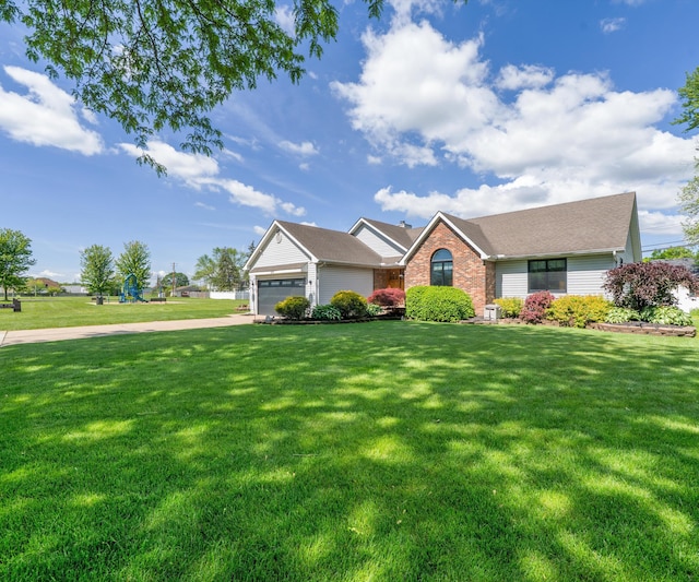 826 Jennie Pl, Monroe, MI 48161 - ranch-style house featuring brick siding, an attached garage, a front yard, and driveway