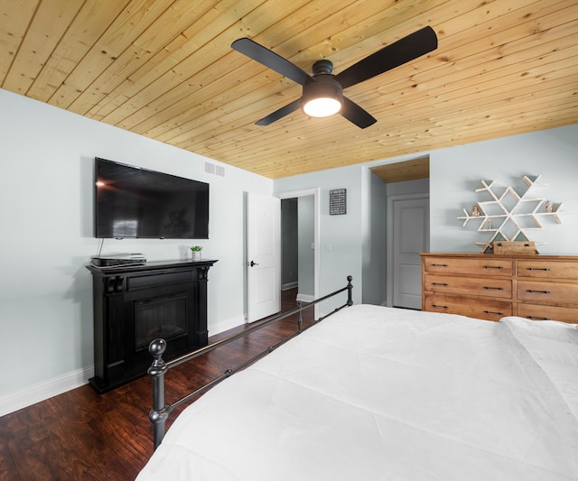 826 Jennie Pl, Monroe, MI 48161 - bedroom with wood ceiling, wood finished floors, a fireplace, baseboards, and a ceiling fan