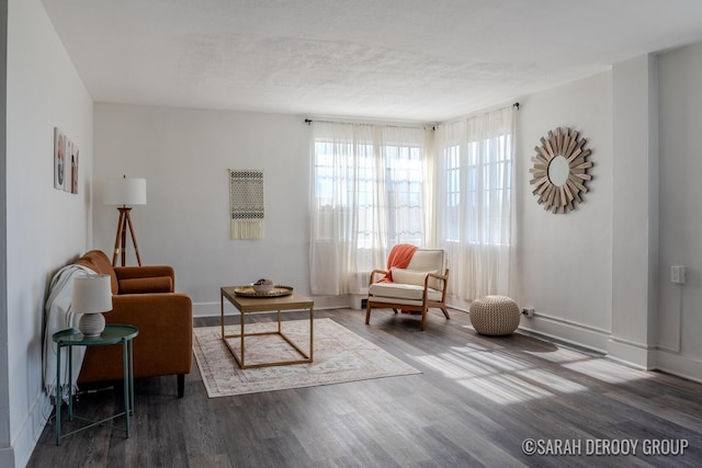 505 Cherry St SE Unit 512, Grand Rapids, MI 49503 - living area featuring wood finished floors and baseboards