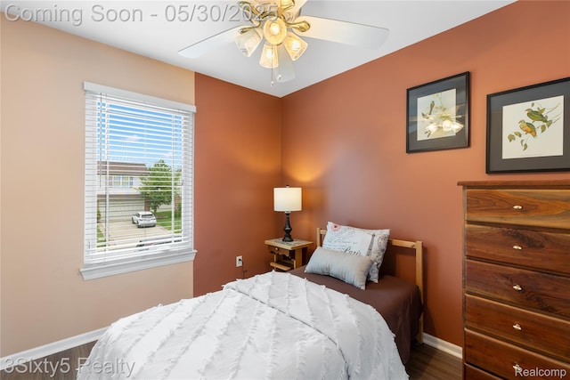 20791 Busenbark Ln, Brownstown, MI 48183 - bedroom featuring baseboards, wood finished floors, and ceiling fan