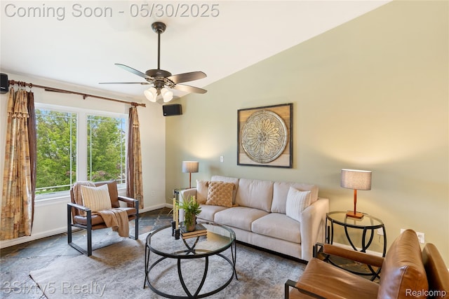20791 Busenbark Ln, Brownstown, MI 48183 - living area featuring baseboards, a ceiling fan, lofted ceiling, and stone finish flooring