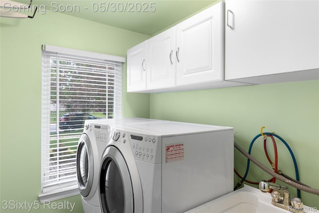 20791 Busenbark Ln, Brownstown, MI 48183 - washroom with cabinet space and washing machine and clothes dryer