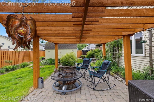 20791 Busenbark Ln, Brownstown, MI 48183 - view of patio featuring a fire pit and a pergola
