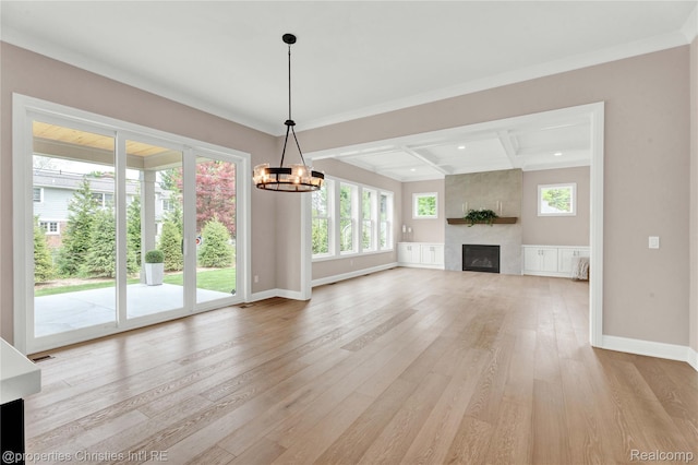 19138 Riverside Dr, Beverly Hills, MI 48025 - unfurnished living room with light wood-style flooring, a chandelier, a large fireplace, baseboards, and coffered ceiling