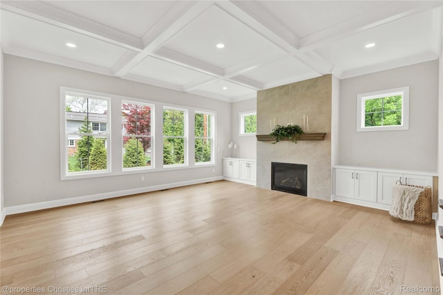 19138 Riverside Dr, Beverly Hills, MI 48025 - unfurnished living room with light wood-type flooring, a fireplace, coffered ceiling, beamed ceiling, and baseboards