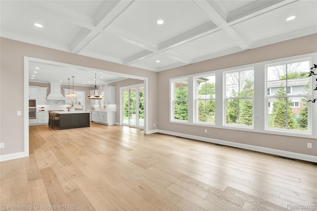 19138 Riverside Dr, Beverly Hills, MI 48025 - unfurnished living room featuring coffered ceiling, light wood-type flooring, baseboards, beamed ceiling, and recessed lighting