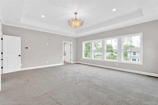 19138 Riverside Dr, Beverly Hills, MI 48025 - carpeted empty room with a tray ceiling, a chandelier, baseboards, and recessed lighting