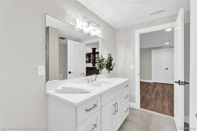 19138 Riverside Dr, Beverly Hills, MI 48025 - bathroom with vanity, baseboards, and toilet