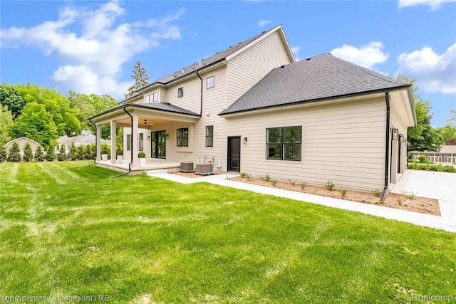 19138 Riverside Dr, Beverly Hills, MI 48025 - back of house featuring a yard, a patio, a shingled roof, and cooling unit