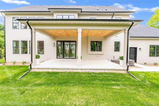 19138 Riverside Dr, Beverly Hills, MI 48025 - back of property with a lawn, a patio, central air condition unit, and roof with shingles