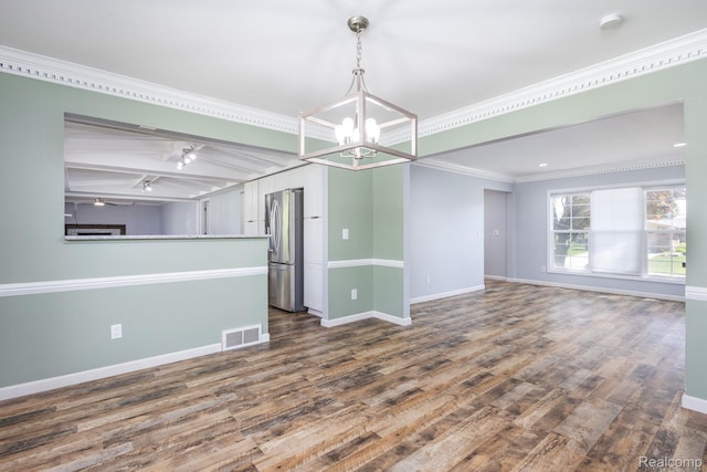667 Heritage Ln, Rochester, MI 48309 - spare room featuring a chandelier, dark wood finished floors, baseboards, crown molding, and a smoke detector